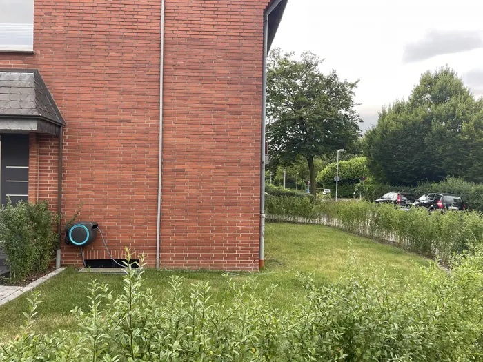 Rasenfläche neben dem Haus der Ferienwohnung Friedrich-Spee in Geldern