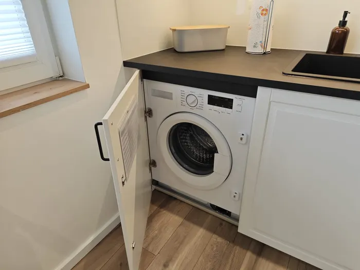 Waschmaschine in der Küchenzeile der Ferienwohnung Friedrich-Spee Obergeschoss