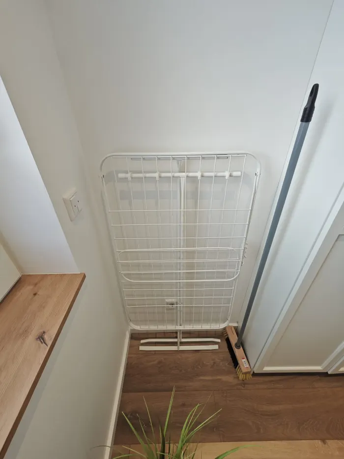 Wäscheständer im Treppenaufgang der Ferienwohnung Friedrich-Spee Obergeschoss